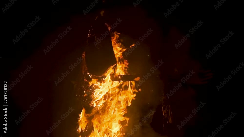 Burning an effigy of the victim at the stake.Witch rituals,Halloween.Burning witches in the dark is a religious tradition.A nightmare,horror.The mystery of evil,magic and mysticism.Esoteric sacrifice