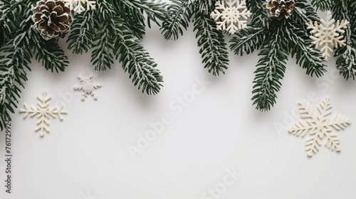 Festive spruce branch and snowflakes frame with space for text on christmas background