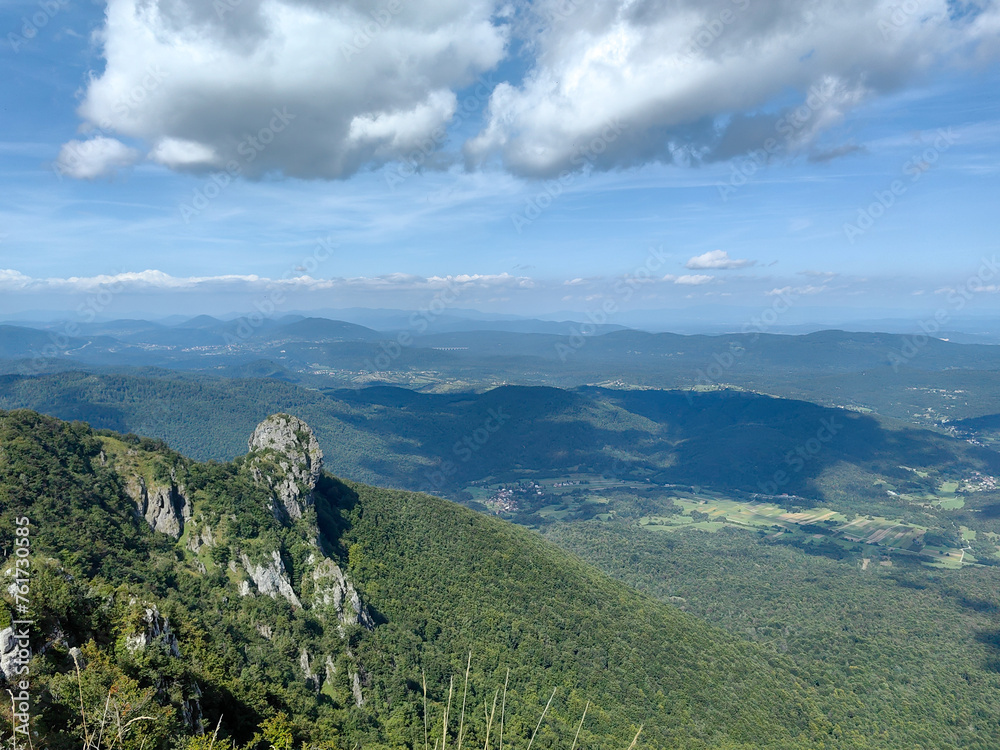 Fototapeta premium Horizontal view of mountain peak on Klek. Klek is mountain in north-western Croatia, near Ogulin in Karlovac County. It is the easternmost mountain of the Velika Kapela range of the Dinaric Alps. 