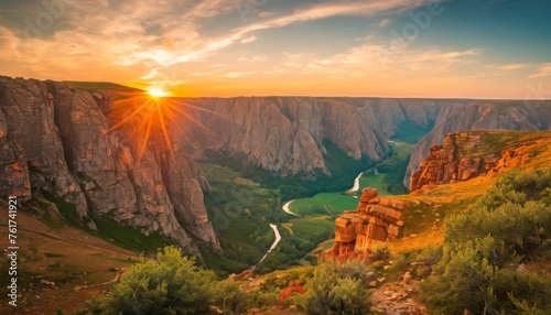  the sun is setting over a canyon with a river running between it and a mountain range with a river running between it.