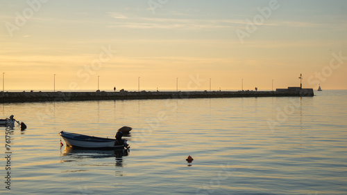 Boats and the pier of Umag at sunset © Rodrigo