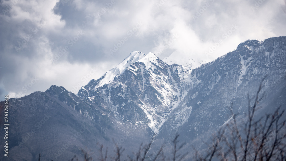 Snowy mountain in winter on a cloudy day