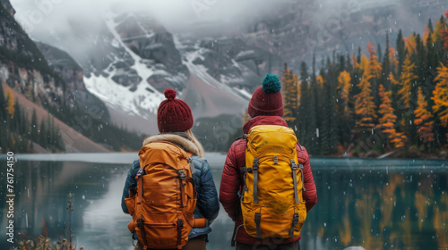 Two Hikers Admiring Mountain Lake