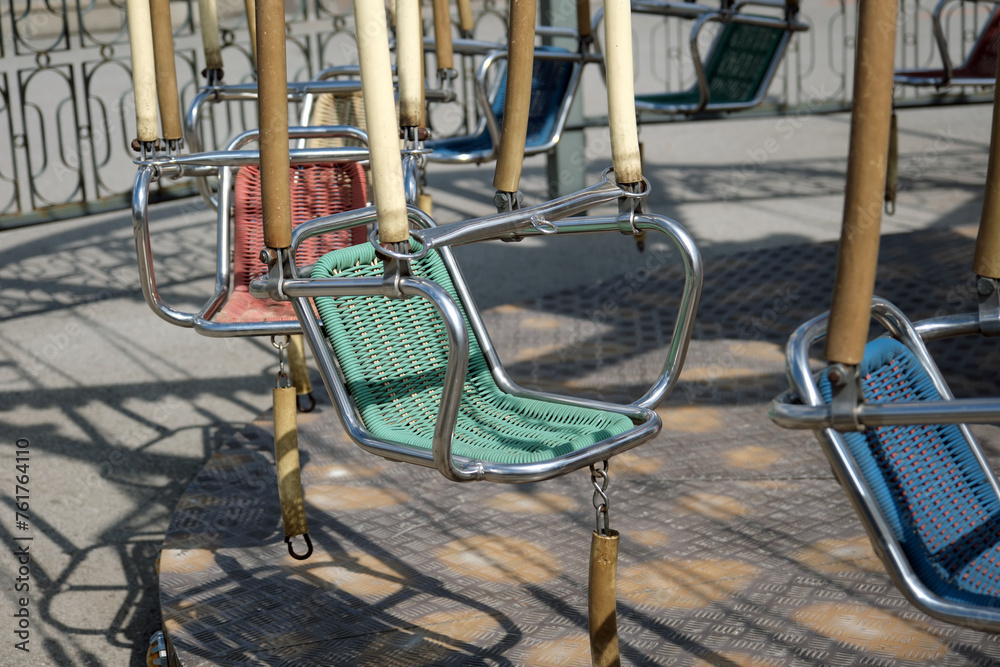 Empty and stable swing carousel chairs. Empty and stable swing carousel chairs.