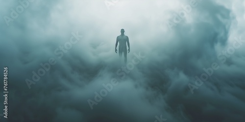 dark silhouette of a man coming out of a misty fog scary