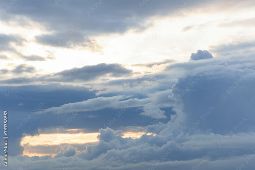 Naklejka premium Very large lush white clouds on a light blue sky