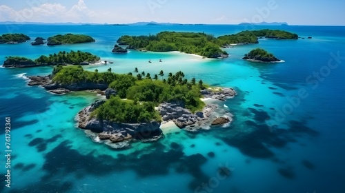 Aerial view of beautiful tropical island with palm trees and turquoise sea.