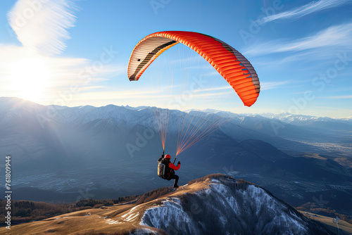 Paragliding against the backdrop of mountains, blured background, copy space photo