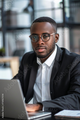 photograph of a black handsome man working as a sales representative in company © نيلو ڤر