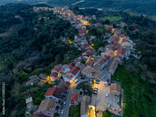 Aerial drone view of traditional Agrafi village in north corfu, Greece by night