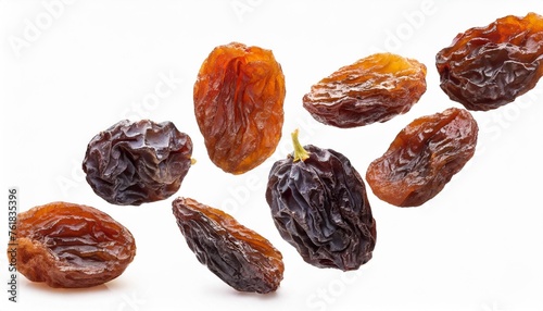 falling raisins isolated on white background