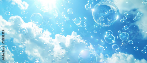 Sunlit soap bubbles floating in the blue sky