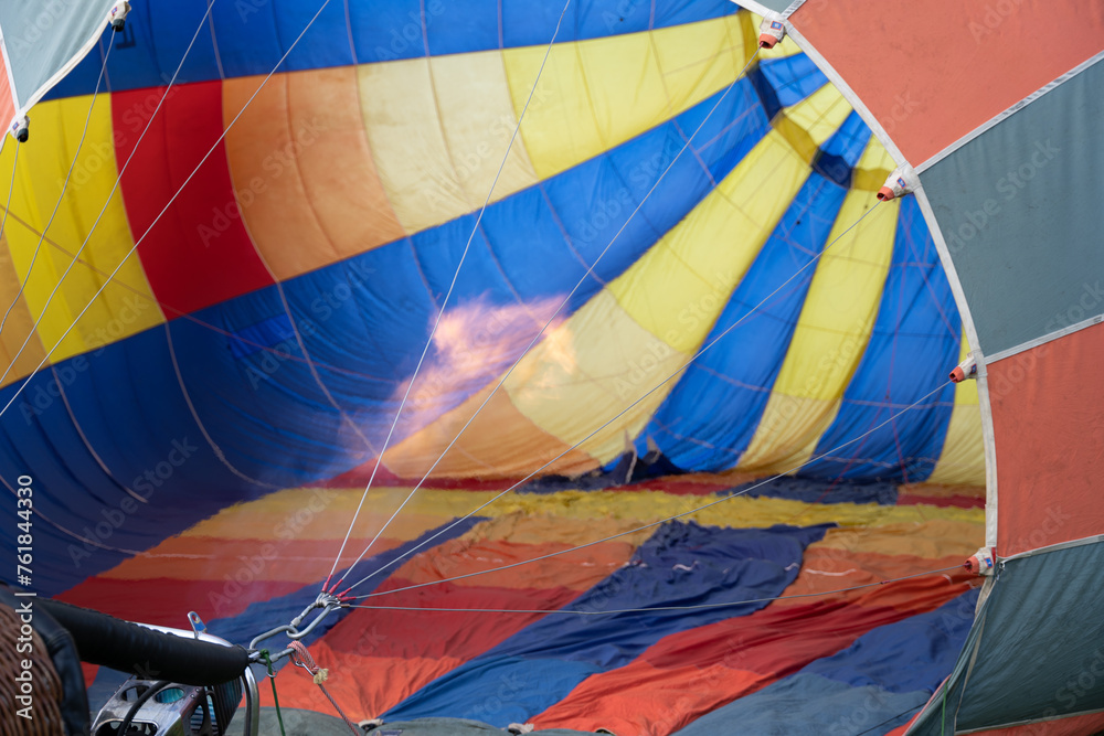 Obraz premium View inside a hot air balloon with flame during inflation