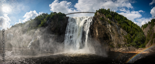 Dramatic Montmorency falls in Quebec, on a sunny summer day.