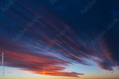 Obraz na płótnie Stunningly beautiful multi-colored violet-pink-lilac evening sky, multi-colored clouds fan out from the lower horizon w salonie
