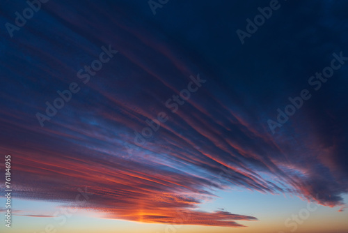 Obraz na płótnie Stunningly beautiful multi-colored violet-pink-lilac evening sky, multi-colored clouds fan out from the lower horizon w salonie