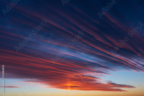 Obraz na płótnie Stunningly beautiful multi-colored violet-pink-lilac evening sky, multi-colored clouds fan out from the lower horizon w salonie
