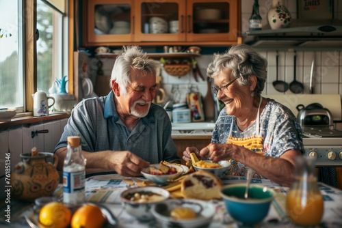 breakfast woman man senior couple home retirement wife husband elderly together happy morning old happiness kitchen love mature eating meal retired