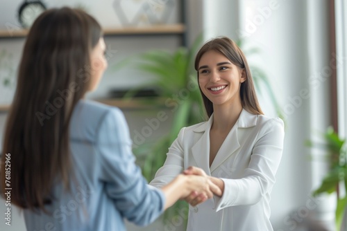 young business people meeting office teamwork celebrating success corporate shaking hands high five introducing welcoming colleague