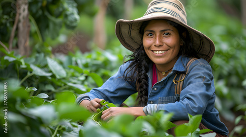 Joyful Gardening: Female Farmer with a Bright Smile Tending to Her Green Crops