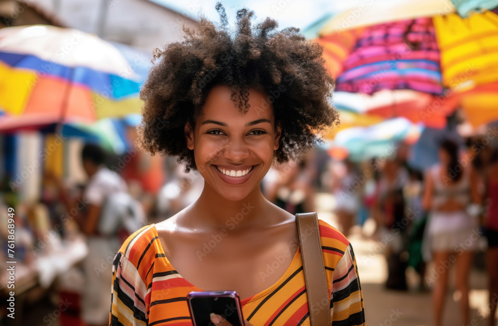 Sunlit Market Splendor: Radiant Woman with Afro Hair and Smartphone