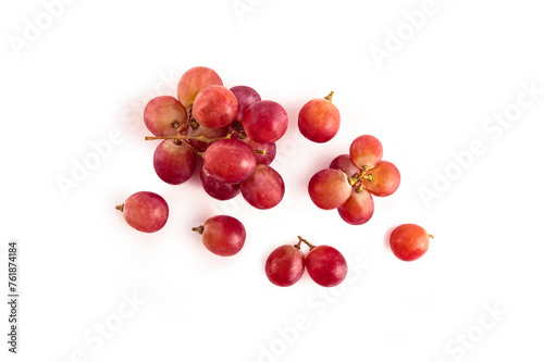 Top view of red grapes on white background.
