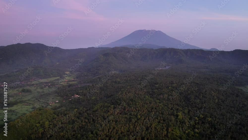 Panoramic aerial shot of Mount Agung and surroundings at sunrise. Bali, Indonesia. Panoramic aerial shot of Mount Agung and surroundings at sunrise. Bali, Indonesia.