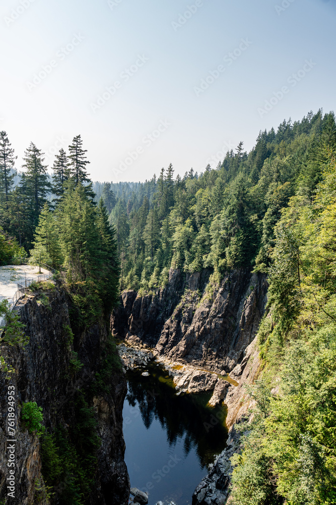 A beautiful view from Cleveland dam to Capilano river with clear blue sky