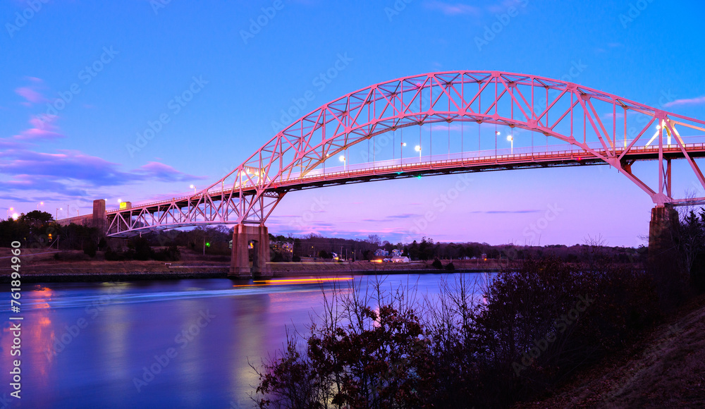 Obraz premium Sagamore Bridge at Night over the Cape Cod Canal on Cape Cod, Massachusetts, USA, Long Exposure Photo