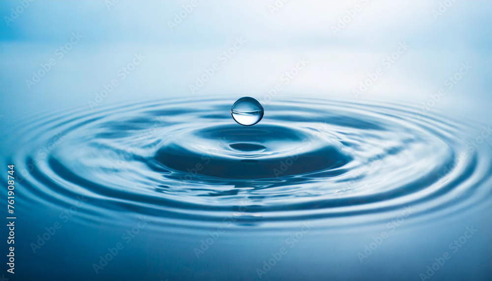 Clear water drop with circular ripples, symbolic of purity and tranquility Clear water drop with circular ripples, symbolic of purity and tranquility