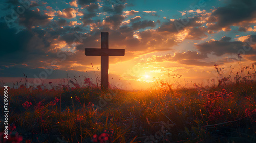Ascension day concept with a cross on a meadow at autumn sunrise photo