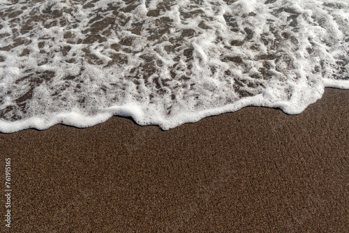 Fototapeta Naklejka Na Ścianę i Meble -  sea waves in the sand abstract background