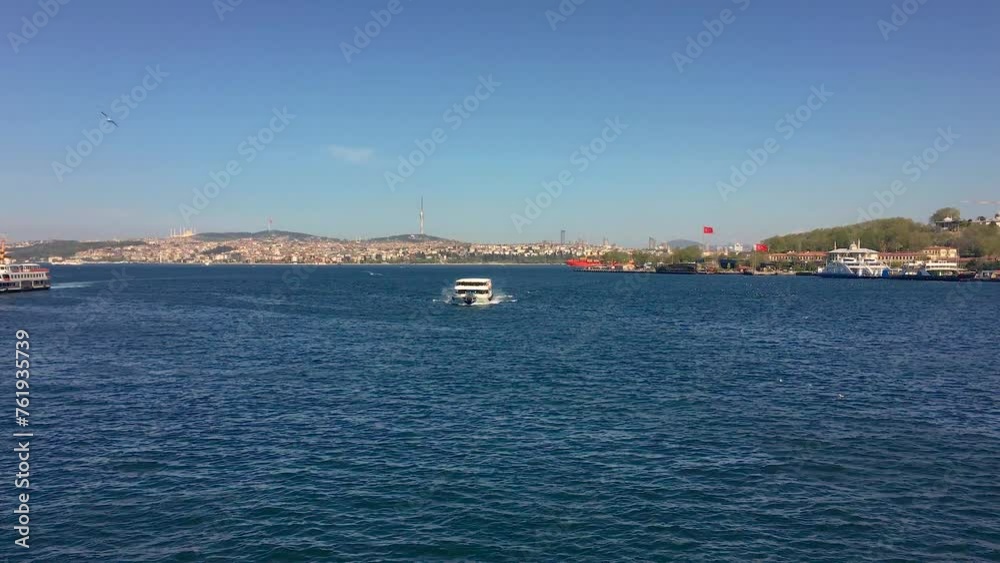 A ferry in Istanbul cruising the Bosporus on a sunny day. A ferry in Istanbul cruising the Bosporus on a sunny day.