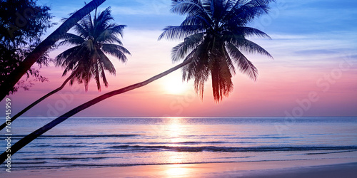 Sunrise on tropical island sea beach, calm ocean sunset, morning dawn panorama landscape, palm tree leaves silhouette, yellow sun reflection, blue water waves, soft pink sky, summer holidays, vacation © Vera NewSib