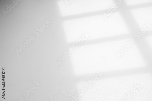 Wall interior background, studio and backdrops show products.with shadow from window color white and grey. background for text insertion and presentation product	