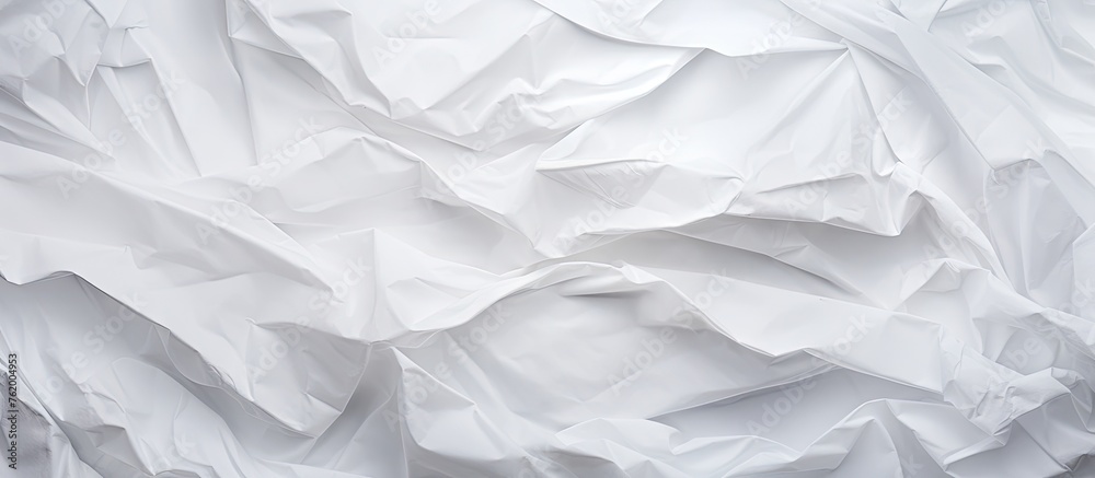 Close up of creased white paper sheet - obrazy, fototapety, plakaty 