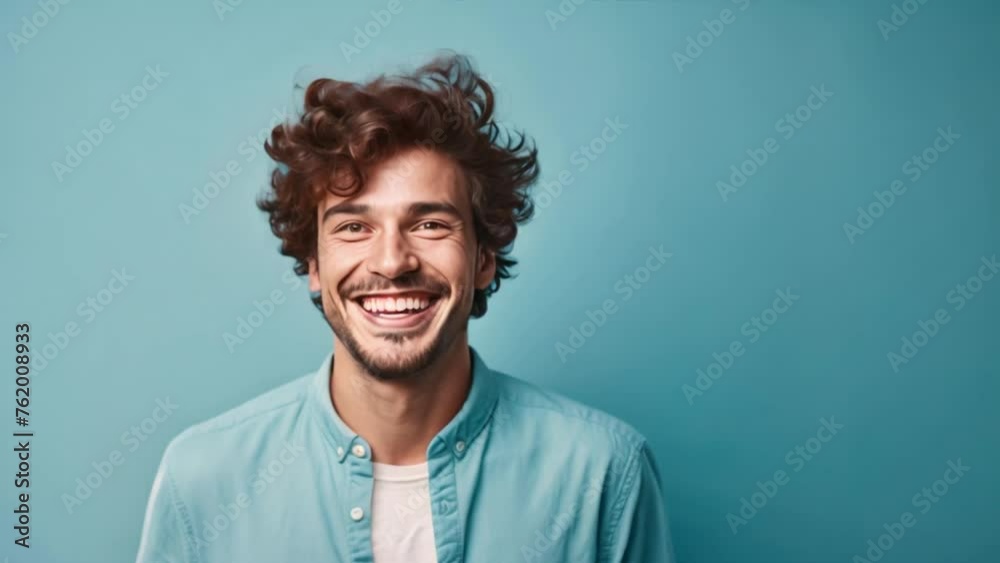 Confident and happy smiling man on blue background,Confident man on blue background pointing in various directions Confident and happy smiling man on blue background,Confident man on blue background pointing in various directions