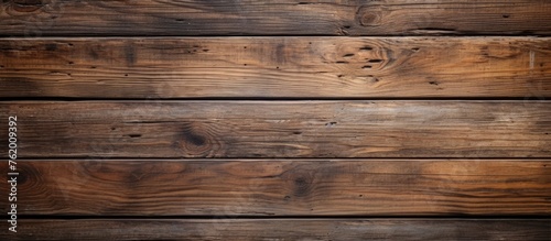 A close-up view of a wooden wall made of plenty of timber planks