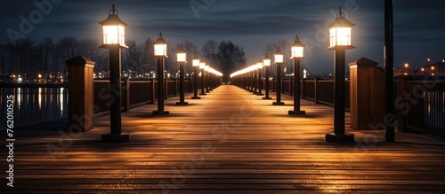 A pier with illuminated lights in the night