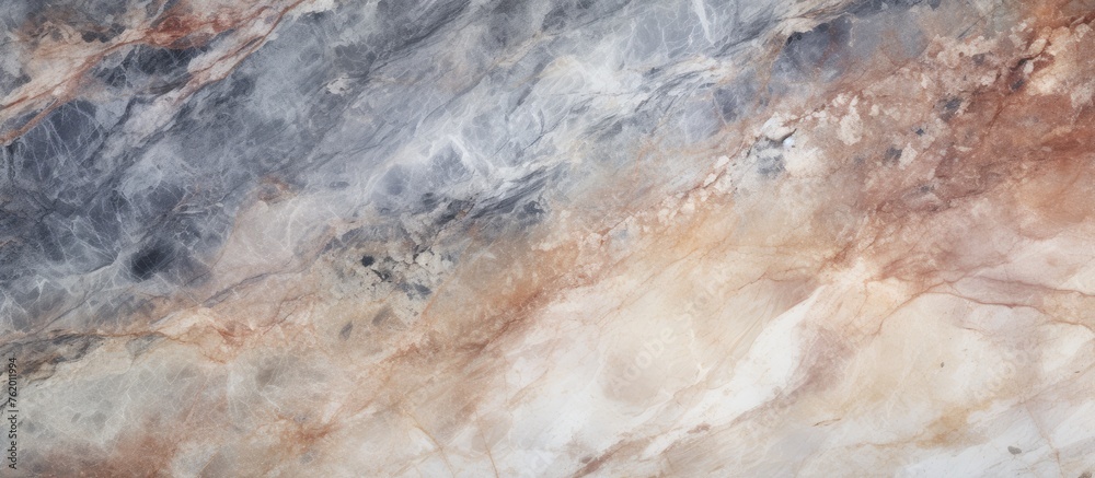 Marble stone texture background with subdued lighting.