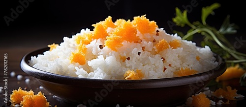 Delicious Rice Bowl Garnished with Vibrant Orange Zest Ideal for Healthy Asian Cuisine photo