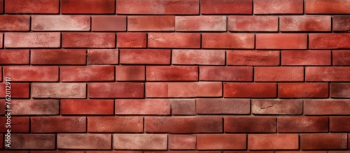A textured red brick wall background
