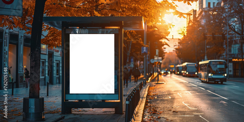 Fototapeta Naklejka Na Ścianę i Meble -  : A blank white billboard at bus stop on street, for advertising mockups and urban city concepts and presentations.Mock up Billboard Media Advertising Poster banner template at Bus Station city street