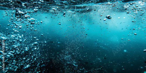 close up air bubbles in water ocean, underwater photography water in natural light, blue and teal enderwater 