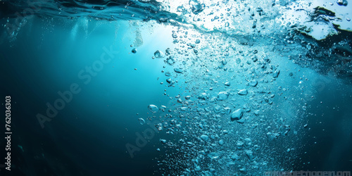 close up air bubbles in water ocean, underwater photography water in natural light, blue and teal enderwater 