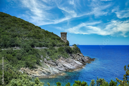 Corsica, the Losse tower, ancient genoese fortress on the coast, seascape in spring

