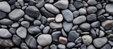 Texture of rocks arranged in a natural grey pattern.