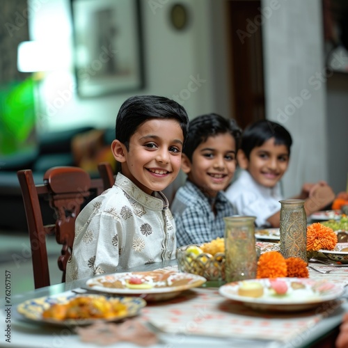 Smiling Indian Children Sitting at Dining Table with Delicious Meals in Home.. Fictional character created by Generated AI. 