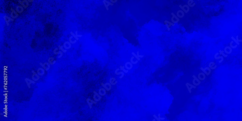 Abstract smoky and grunge blue texture with grunge effect, grunge blue background texture with grainy smoke effect, watercolor painted mottled blue background with vintage marbled texture.