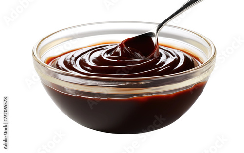 Spoon in Glass Bowl Filled With Sauce. On a White or Clear Surface PNG Transparent Background.